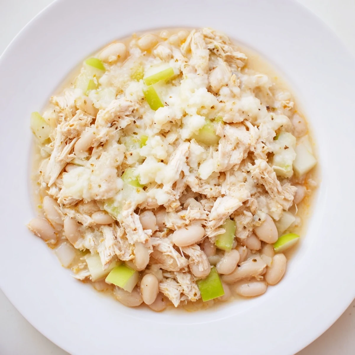 Picture perfect: A steaming serving of 35-Minute White Cheddar Apple Chicken Chili on a chilly day.