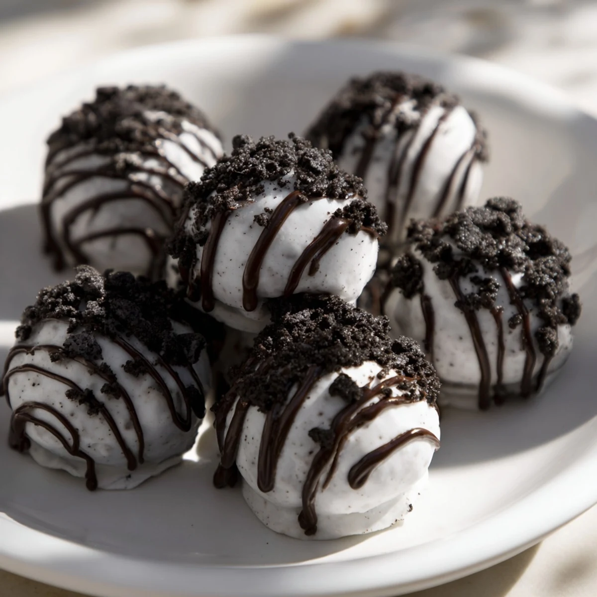 The smooth, creamy inside of Simplified Christmas Oreo Truffles, coated in candy melts and sprinkled.