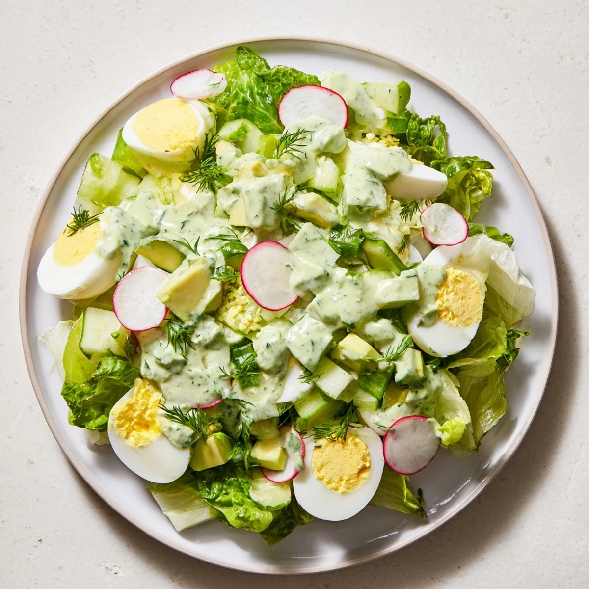 Beautifully plated Green Goddess Chopped Egg Salad, ideal for a picnic or a satisfying, light meal.