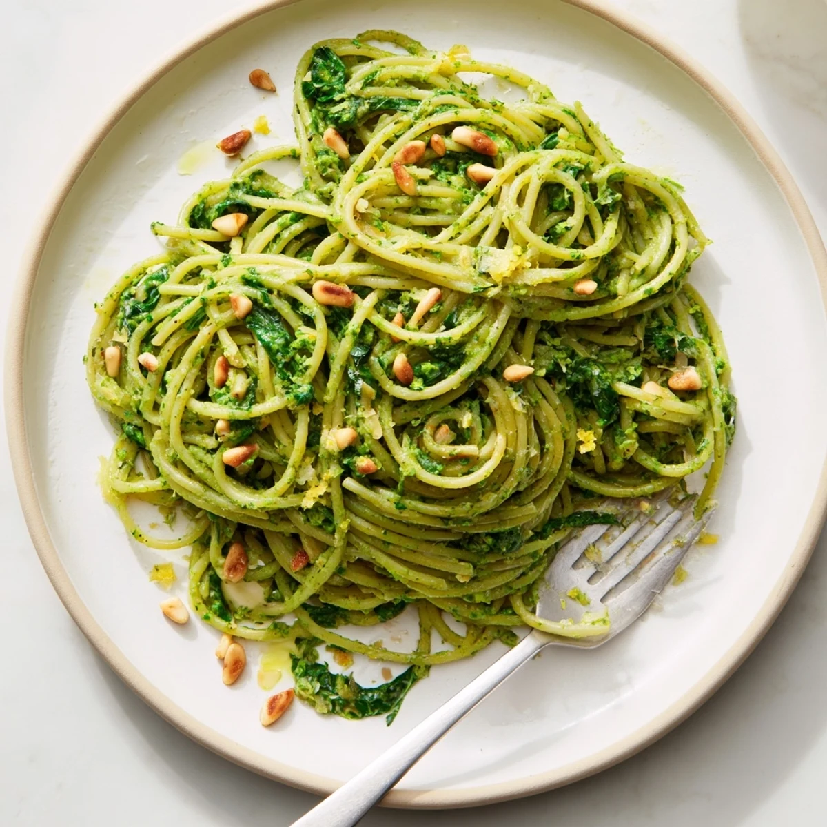 Creamy Green Pea & Spinach Pasta served in a bowl, a vibrantly delicious protein-rich meal.