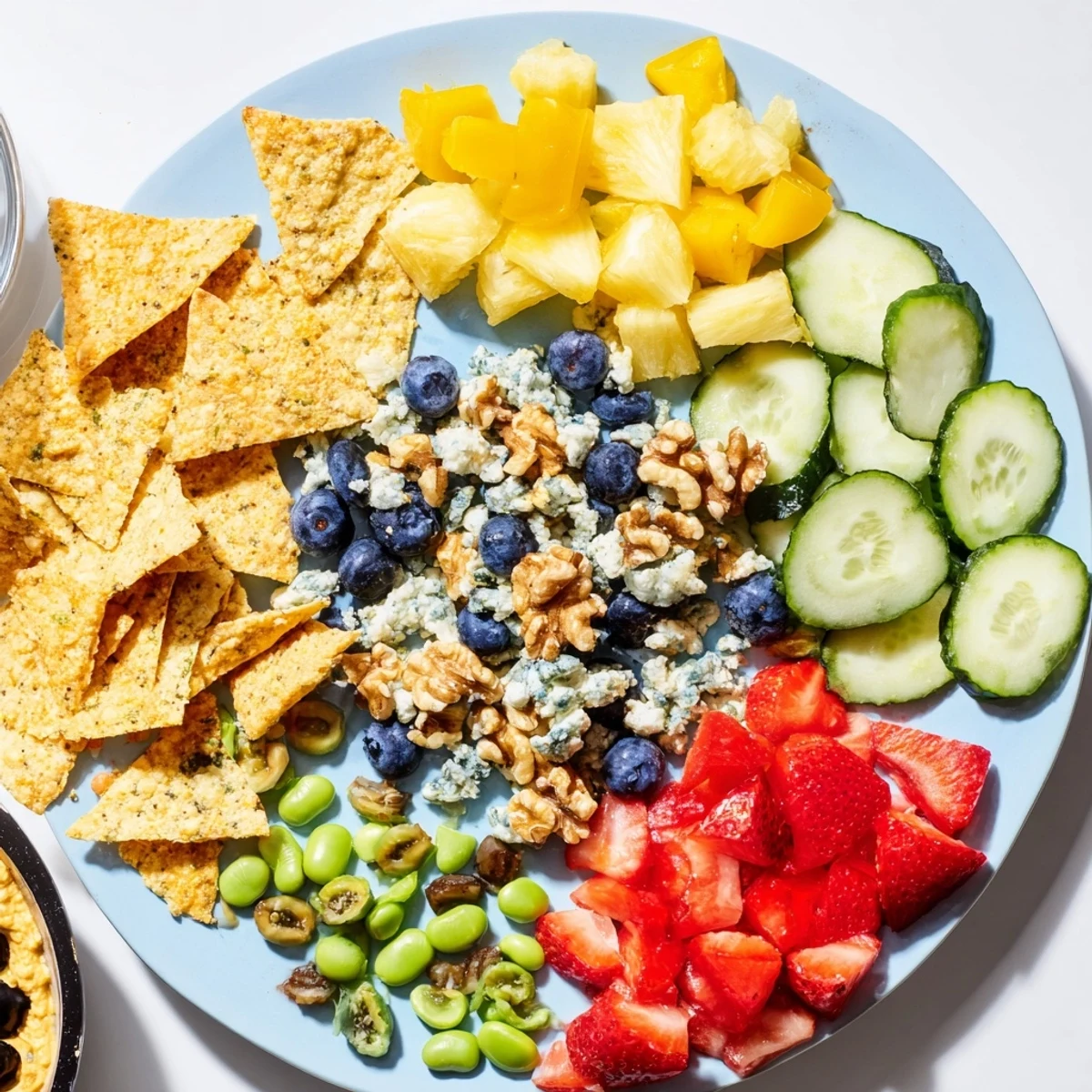 This visually enticing Olympic Rings Interlock appetizer demonstrates a healthy and creative party snack arrangement.