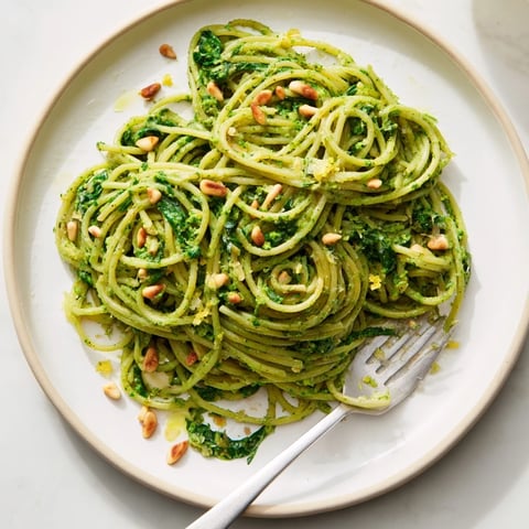 Creamy Green Pea & Spinach Pasta served in a bowl, a vibrantly delicious protein-rich meal.