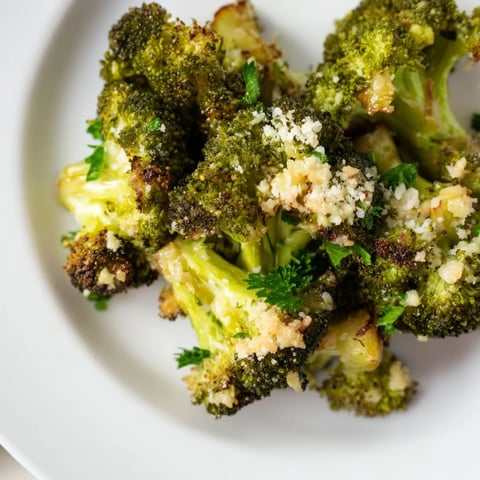 Golden Garlic Parmesan Roasted Broccoli, crispy and flavorful, perfect as a vibrant side.