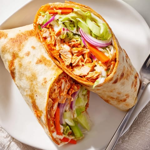 Imagine the steam: Air Fryer Buffalo Turkey Christmas Wraps, boasting a spicy, festive delight.