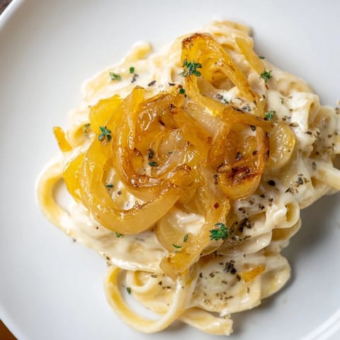 Creamy, cheesy one-pot French onion pasta offers a comforting blend of savory flavors and textures.